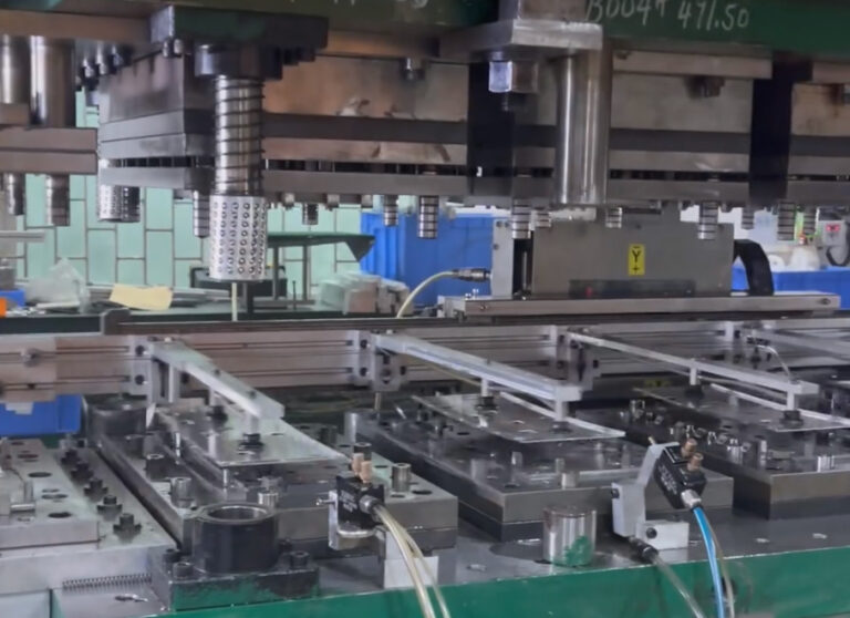 Picture 6 - Transfer Mold Stamping_Robot Transferring Parts